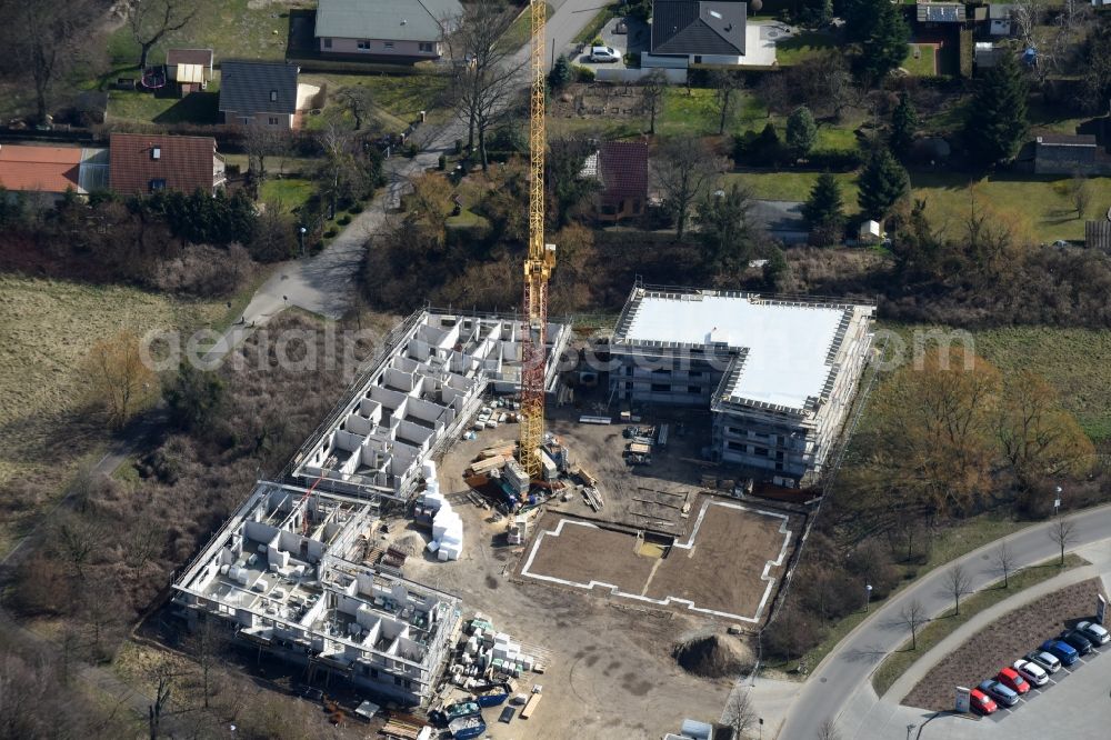 Aerial photograph Fredersdorf-Vogelsdorf - Construction site to build a new multi-family residential complex Refugium am Muehlenfliess an der Brueckenstrasse in Fredersdorf-Vogelsdorf in the state Brandenburg