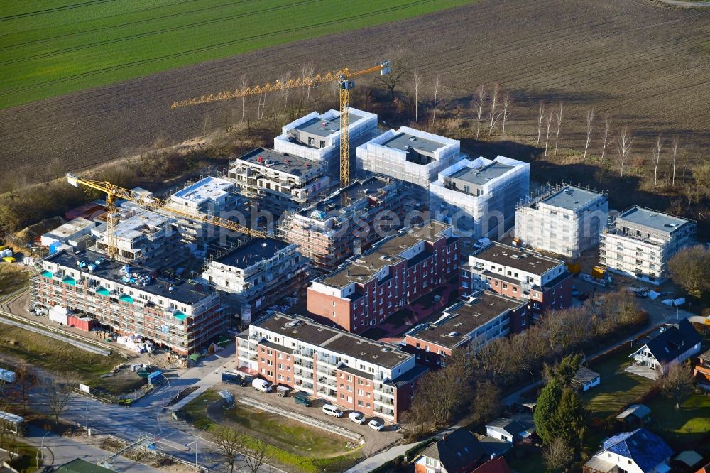 Hamburg from the bird's eye view: Construction site to build a new multi-family residential complex on Reinbeker Redder - Am Hirtenland in Hamburg, Germany