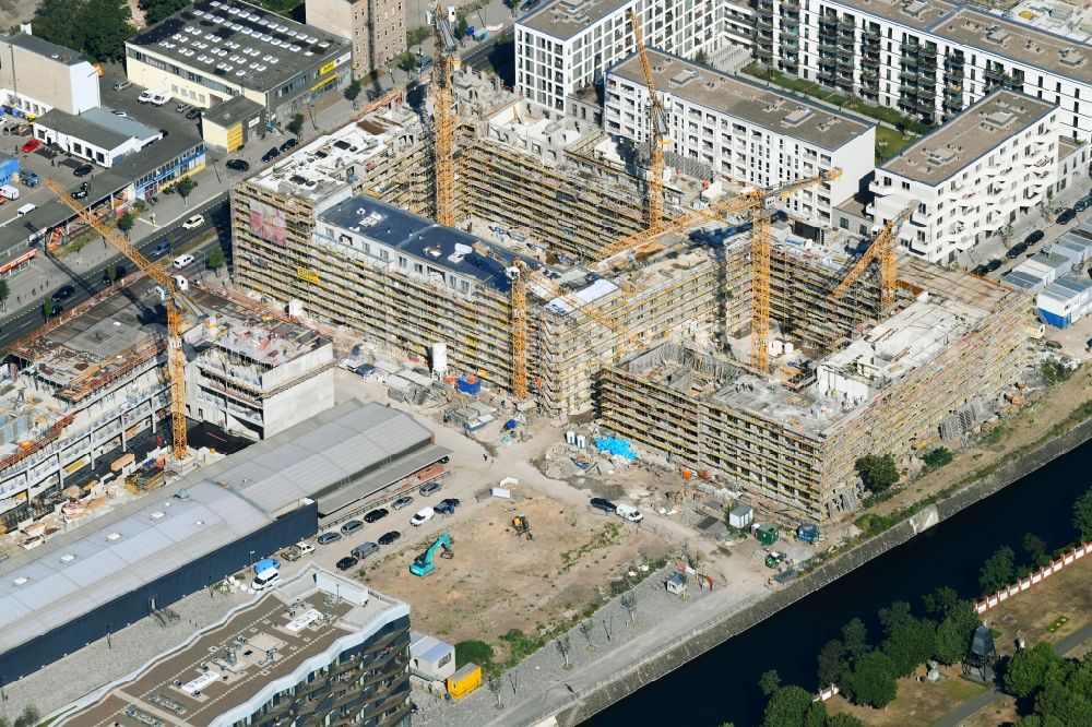 Berlin from the bird's eye view: Construction site to build a new multi-family residential complex of Richard Ditting GmbH & Co. KG on Heidestrasse in Berlin, Germany