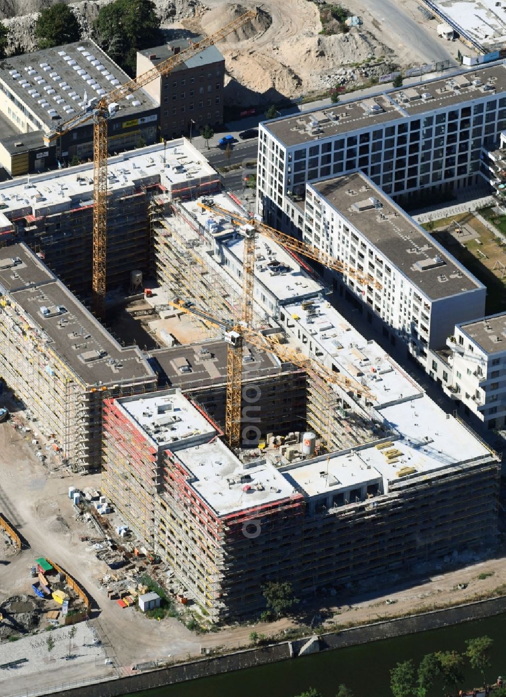 Aerial photograph Berlin - Construction site to build a new multi-family residential complex of Richard Ditting GmbH & Co. KG on Heidestrasse in Berlin, Germany