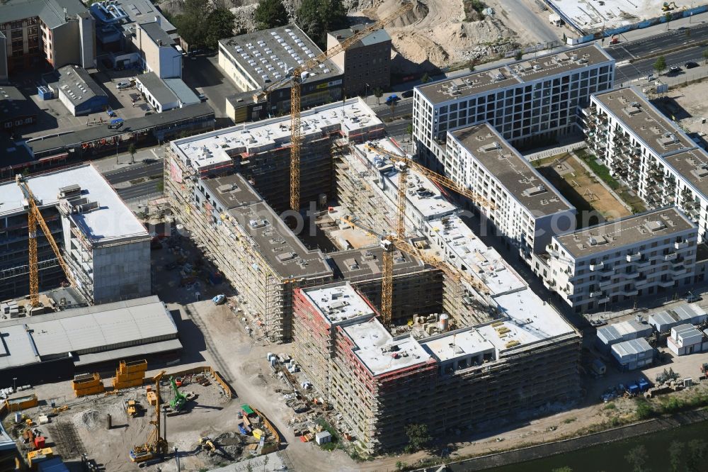 Berlin from above - Construction site to build a new multi-family residential complex of Richard Ditting GmbH & Co. KG on Heidestrasse in Berlin, Germany