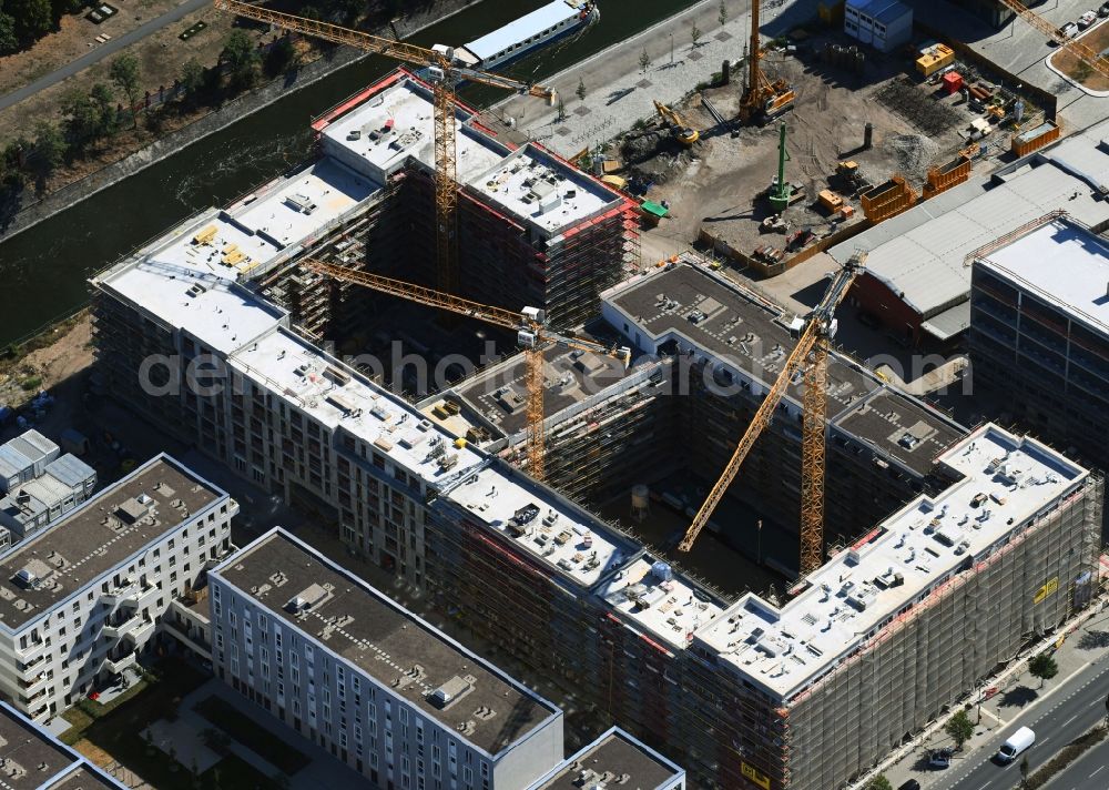 Berlin from above - Construction site to build a new multi-family residential complex of Richard Ditting GmbH & Co. KG on Heidestrasse in Berlin, Germany