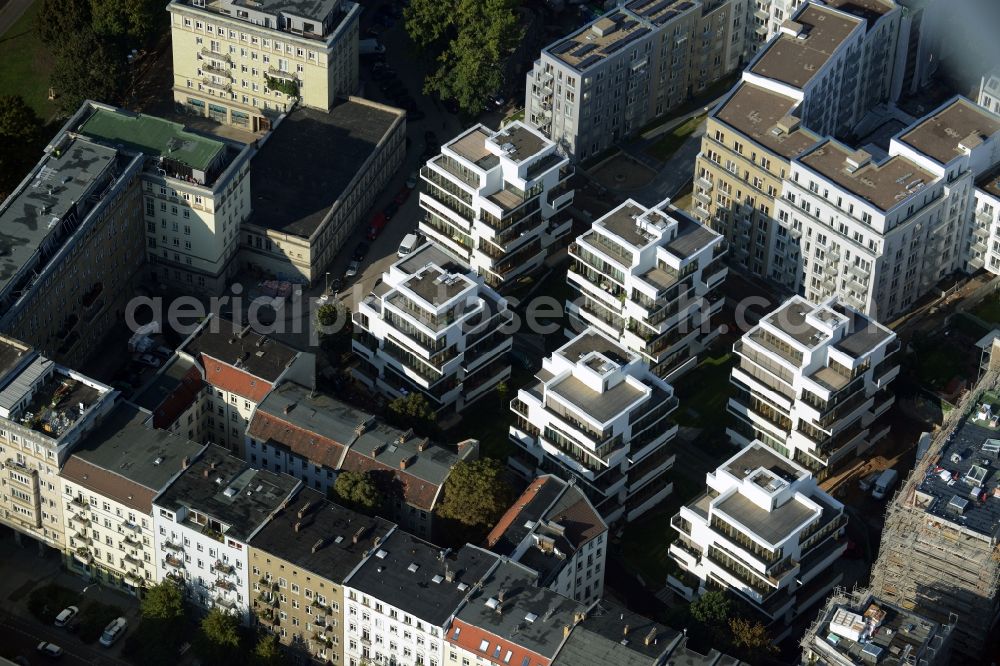 Berlin from the bird's eye view: Construction site to build a new multi-family residential complex on Rigaer Strasse - Liebigstrasse in Friedrichshain destrict of Berlin in Germany