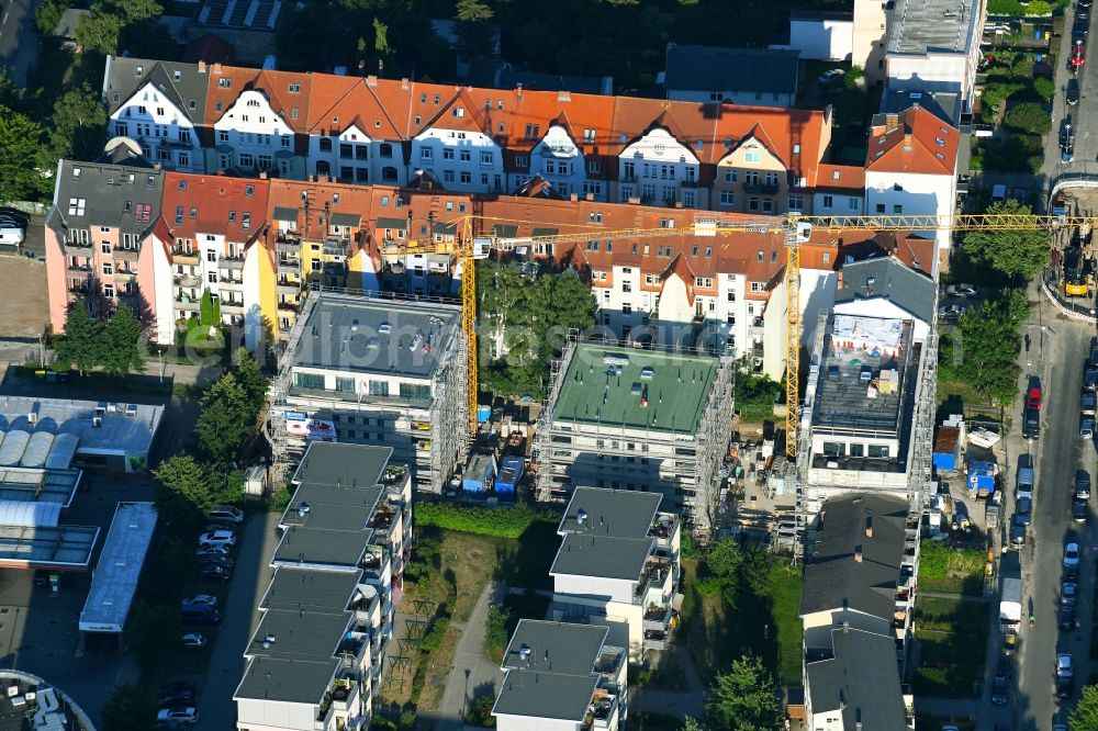 Rostock from above - Construction site to build a new multi-family residential complex on Warnowufer in Rostock in the state Mecklenburg - Western Pomerania, Germany