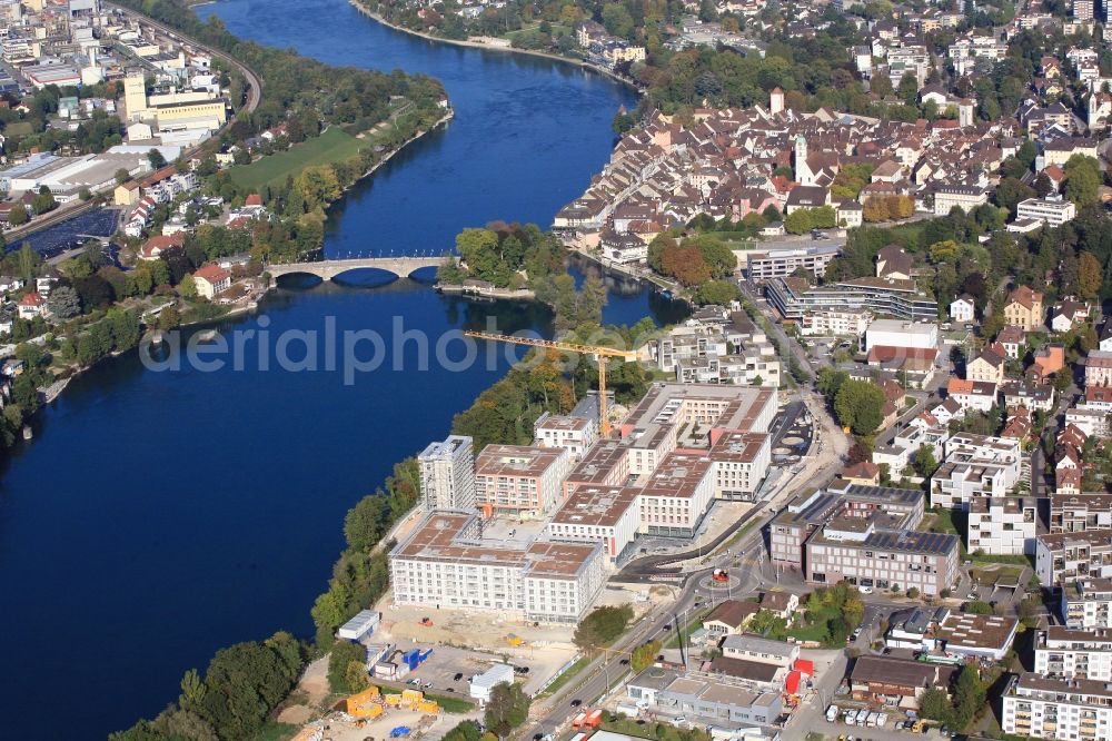 Rheinfelden from above - Construction site for building a new multi-family residential complex Salmen Park on a former brewery site in Rheinfelden in Switzerland at the river Rhine