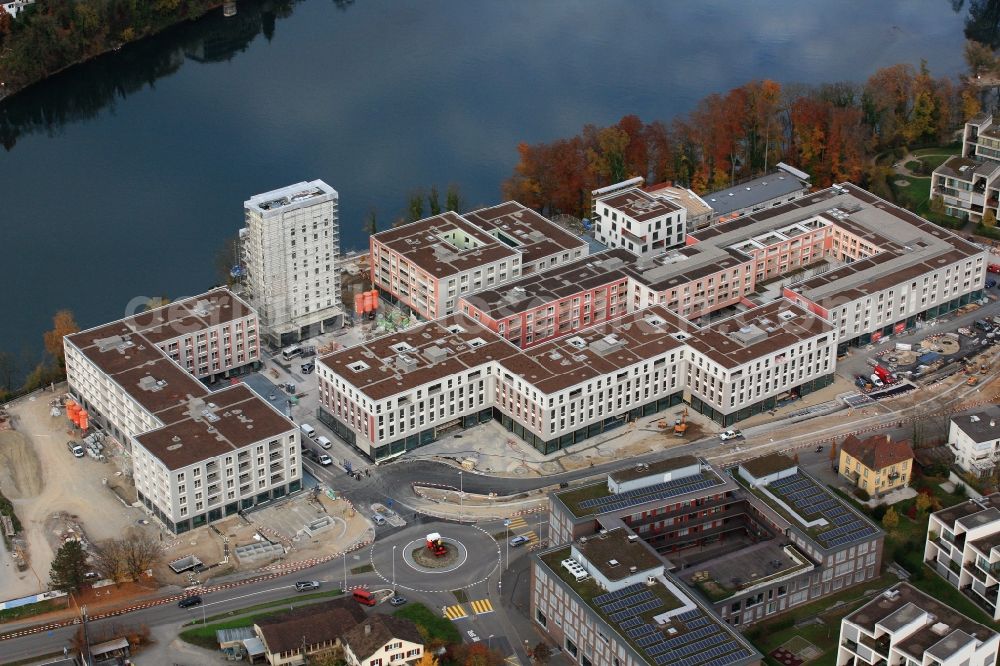 Aerial image Rheinfelden - Construction site for building a new multi-family residential complex Salmen Park on a former brewery site in Rheinfelden in Switzerland at the river Rhine