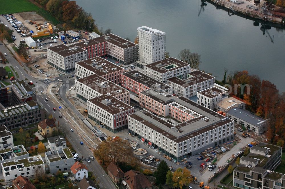 Aerial photograph Rheinfelden - Construction site for building a new multi-family residential complex Salmen Park on a former brewery site in Rheinfelden in Switzerland at the river Rhine