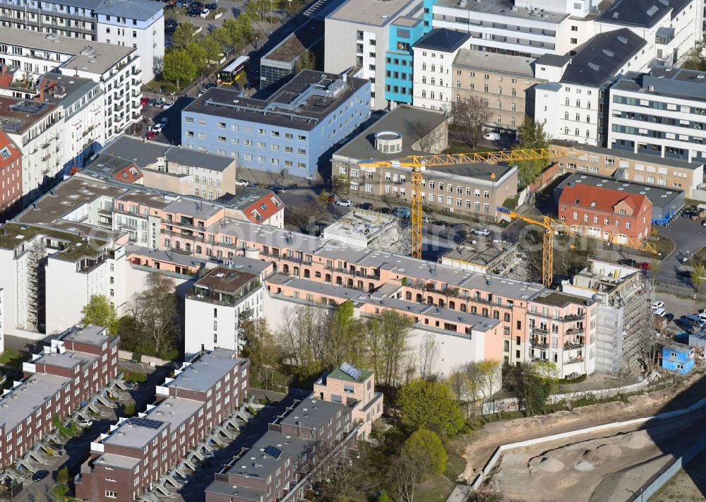 Aerial photograph Berlin - Construction site to build a new multi-family residential complex on Scharnhorststrasse - Ida von Arnim Strasse in the district Mitte in Berlin, Germany