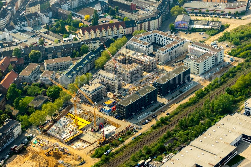 Düsseldorf from the bird's eye view: Construction site to build a new multi-family residential complex Schoeffenhoefe of Vivawest Wohnen GmbH on Mindener Strasse in Duesseldorf in the state North Rhine-Westphalia, Germany