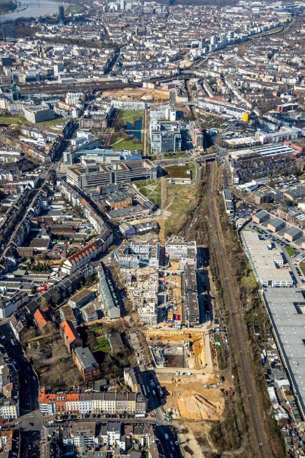 Düsseldorf from the bird's eye view: Construction site to build a new multi-family residential complex Schoeffenhoefe of Vivawest Wohnen GmbH on Mindener Strasse in Duesseldorf in the state North Rhine-Westphalia, Germany