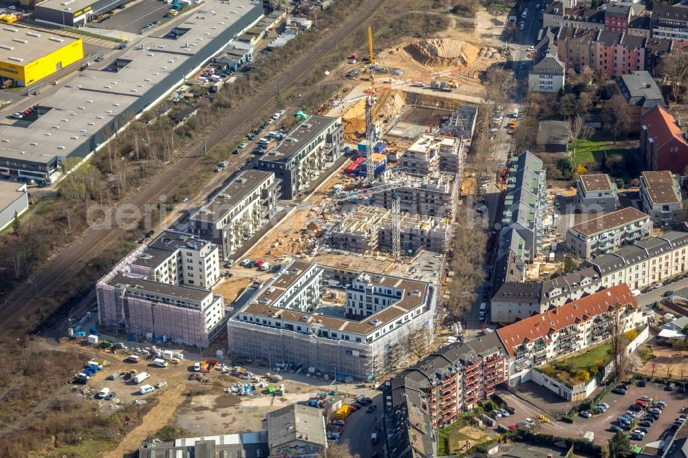 Düsseldorf from the bird's eye view: Construction site to build a new multi-family residential complex Schoeffenhoefe of Vivawest Wohnen GmbH on Mindener Strasse in Duesseldorf in the state North Rhine-Westphalia, Germany