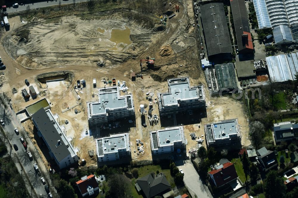 Berlin from the bird's eye view: Construction site to build a new multi-family residential complex of Schmohl + Sohn Bauunternehmung GmbH an der Sundgauer Strasse - Schlettstadter Strasse in Berlin in Germany