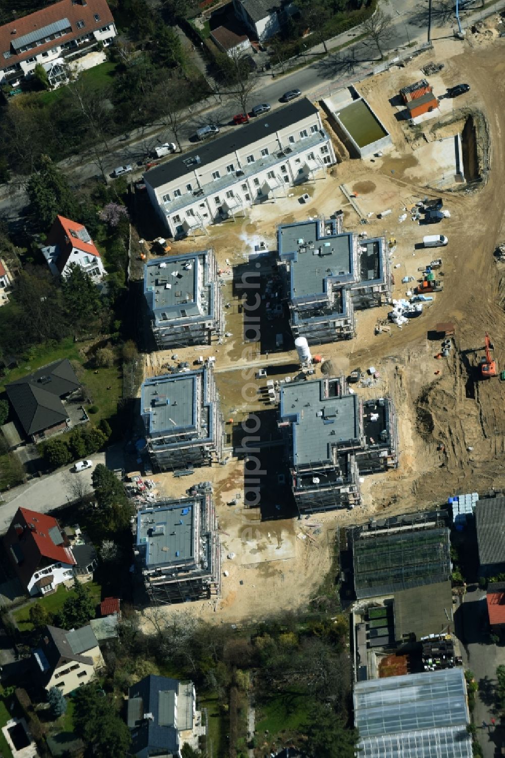 Berlin from the bird's eye view: Construction site to build a new multi-family residential complex of Schmohl + Sohn Bauunternehmung GmbH an der Sundgauer Strasse - Schlettstadter Strasse in Berlin in Germany