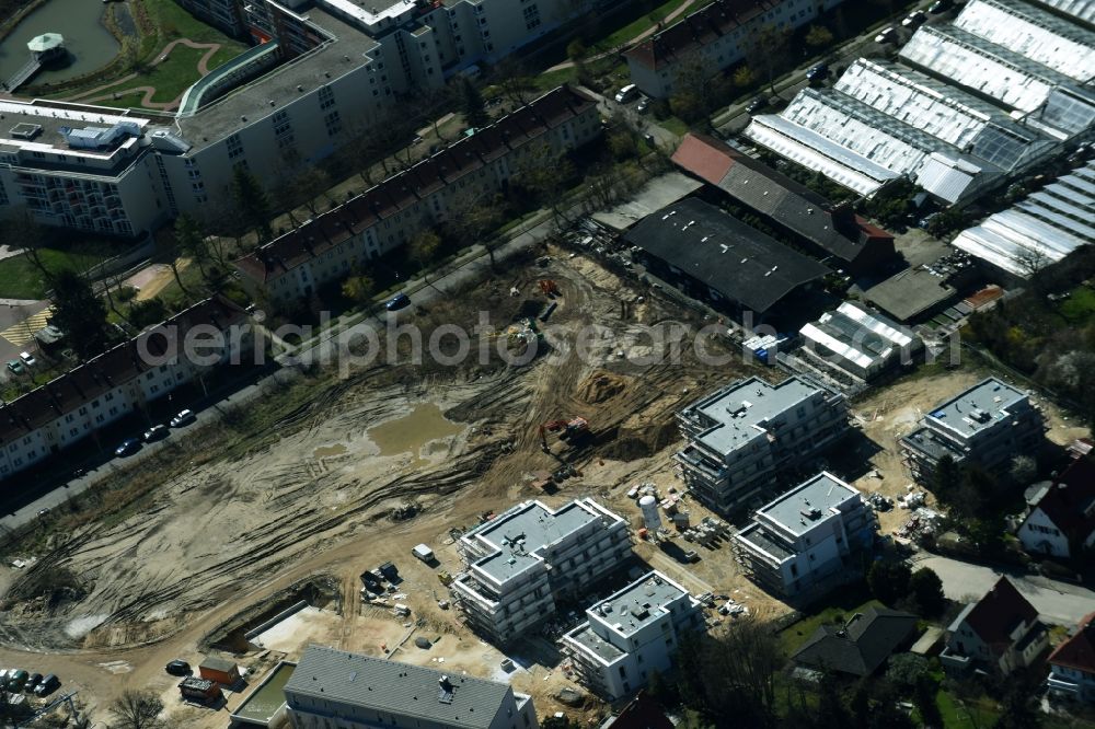 Berlin from the bird's eye view: Construction site to build a new multi-family residential complex of Schmohl + Sohn Bauunternehmung GmbH an der Sundgauer Strasse - Schlettstadter Strasse in Berlin in Germany