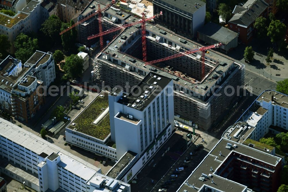 Aerial photograph Berlin - Construction site to build a new multi-family residential complex on Kurfuerstenstrasse corner Genthiner Strasse in Berlin, Germany