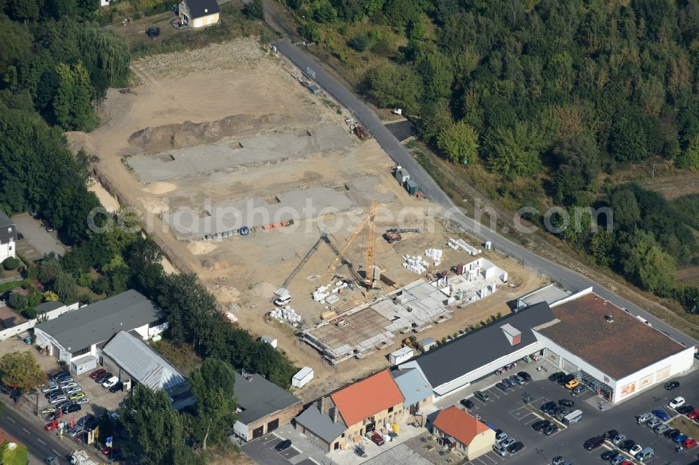 Berlin from above - Construction site to build a new multi-family residential complex An der Schule destrict Mahlsdorf in Berlin