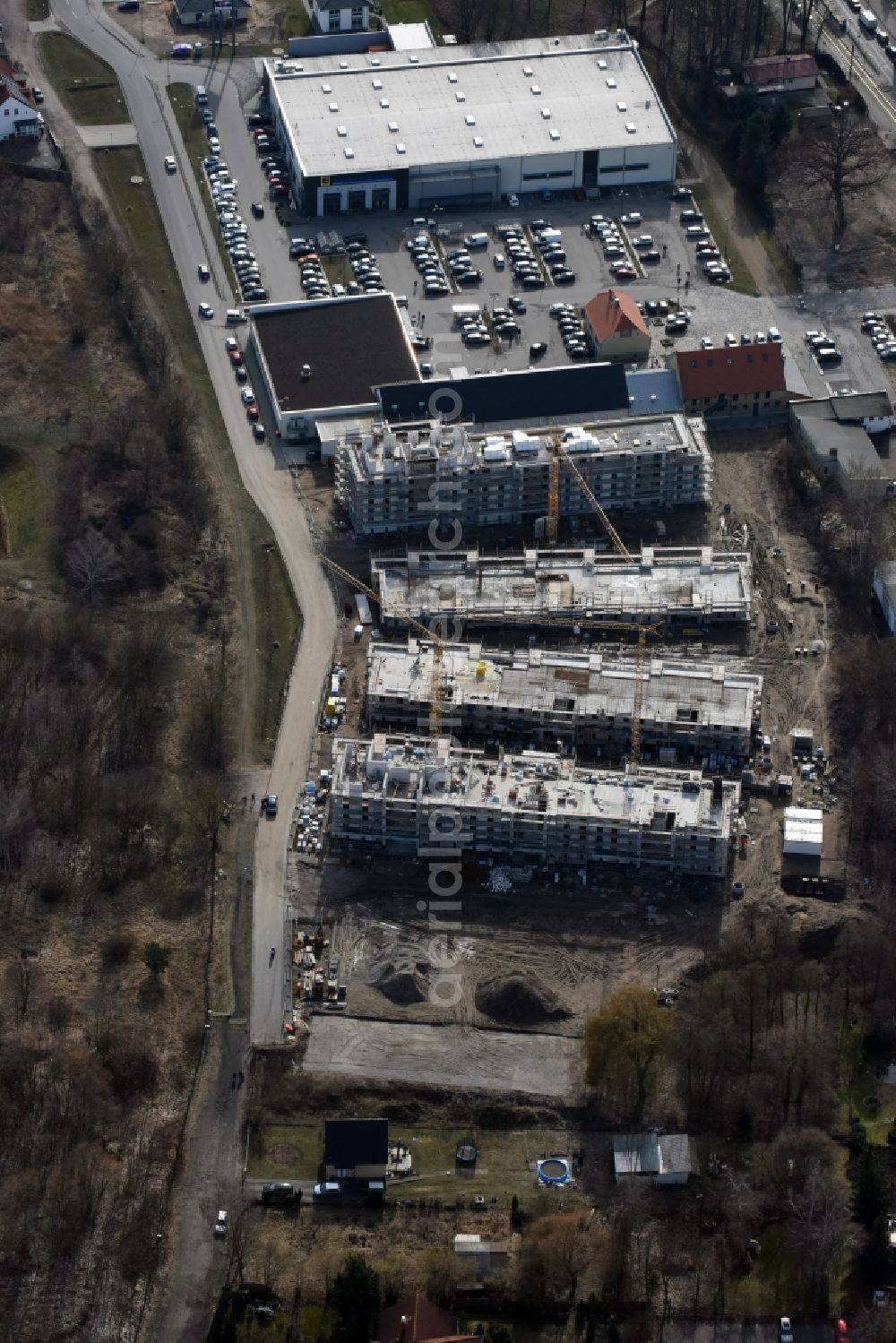 Berlin from above - Construction site to build a new multi-family residential complex An der Schule destrict Mahlsdorf in Berlin