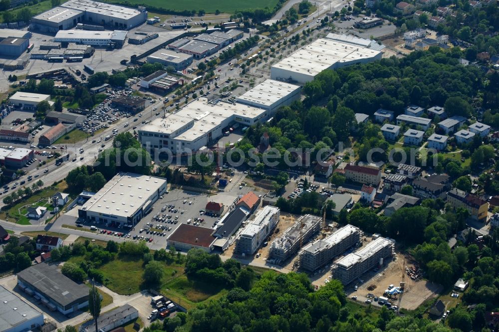 Berlin from the bird's eye view: Construction site to build a new multi-family residential complex An der Schule destrict Mahlsdorf in Berlin