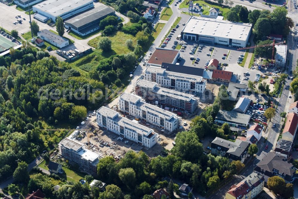 Berlin from the bird's eye view: Construction site to build a new multi-family residential complex An der Schule destrict Mahlsdorf in Berlin