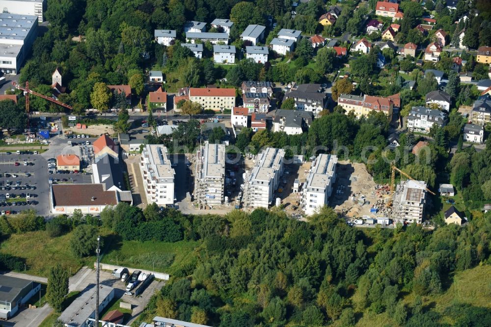 Berlin from the bird's eye view: Construction site to build a new multi-family residential complex An der Schule destrict Mahlsdorf in Berlin