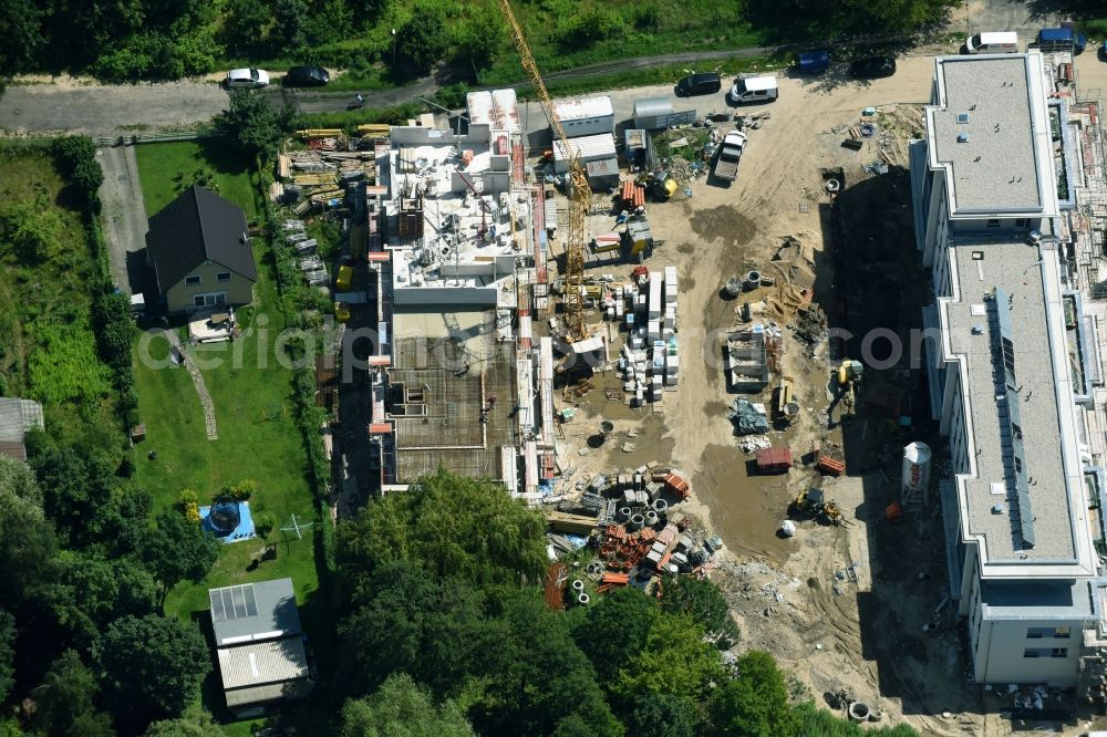 Berlin from above - Construction site to build a new multi-family residential complex An der Schule destrict Mahlsdorf in Berlin