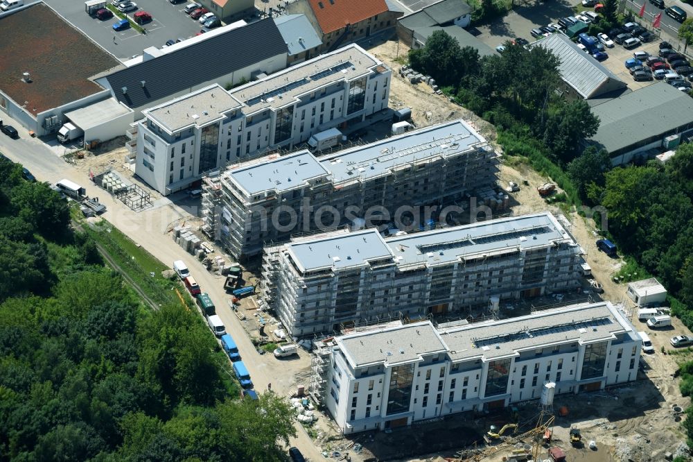 Berlin from above - Construction site to build a new multi-family residential complex An der Schule destrict Mahlsdorf in Berlin