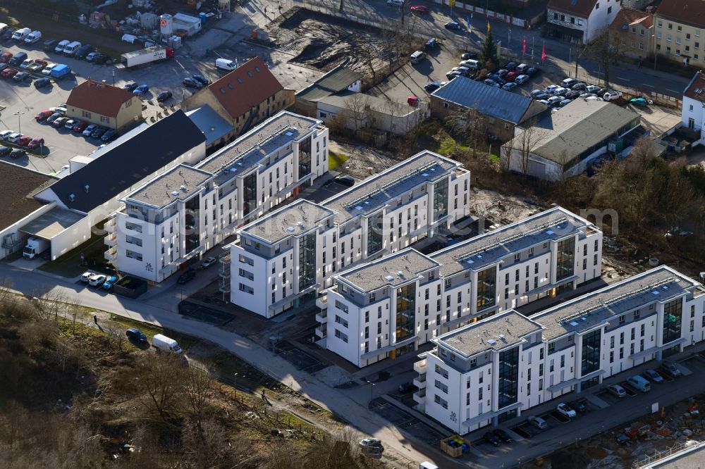 Berlin from the bird's eye view: Construction site to build a new multi-family residential complex An der Schule destrict Mahlsdorf in Berlin