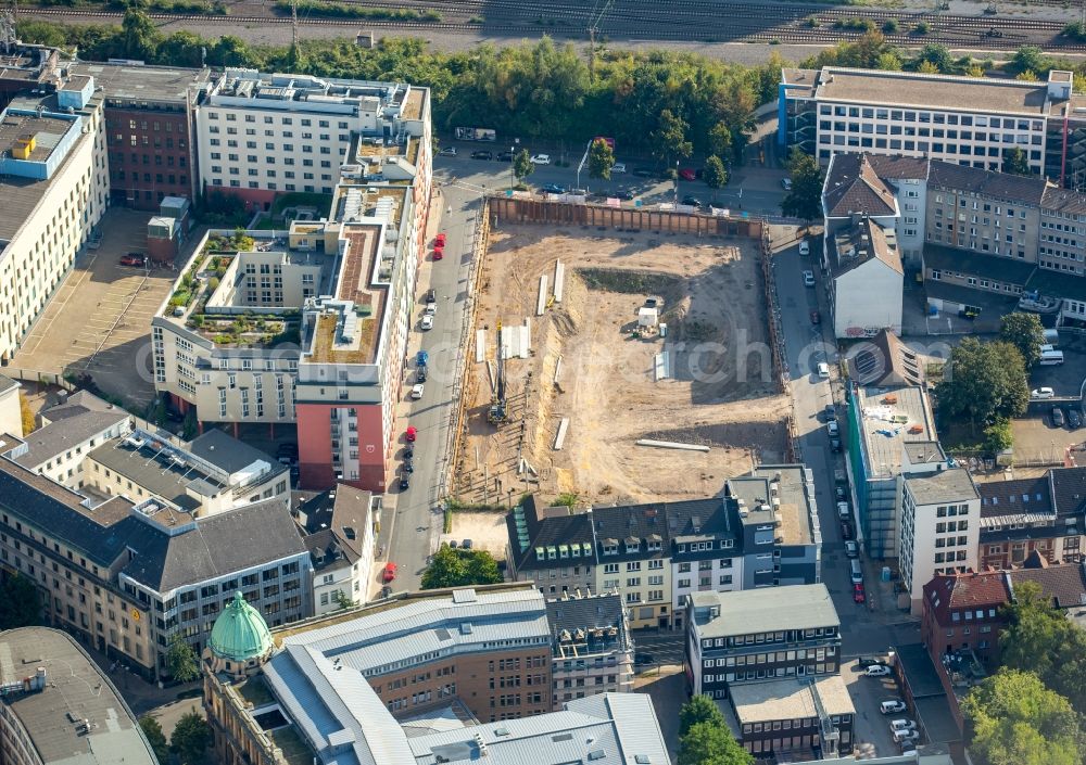 Essen from the bird's eye view: Construction site to build a new multi-family residential complex Selmastrasse - Henriettenstrasse - Hachestrasse in Essen in the state North Rhine-Westphalia