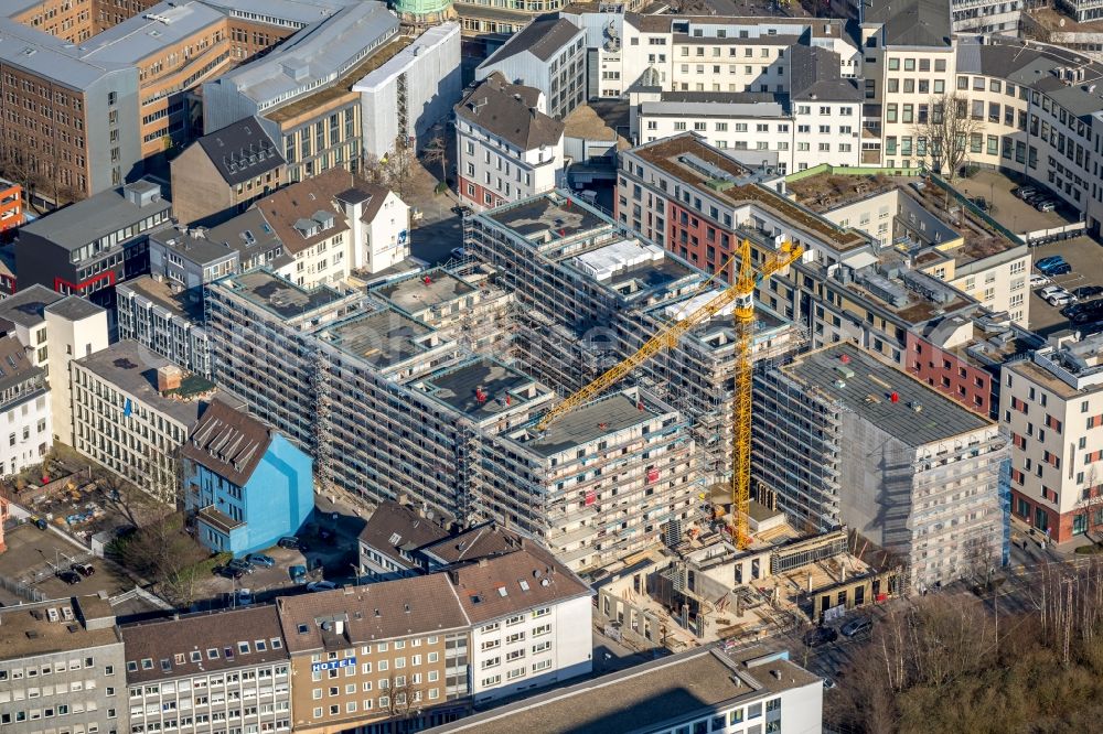 Essen from the bird's eye view: Construction site to build a new multi-family residential complex Selmastrasse - Henriettenstrasse - Hachestrasse in Essen in the state North Rhine-Westphalia