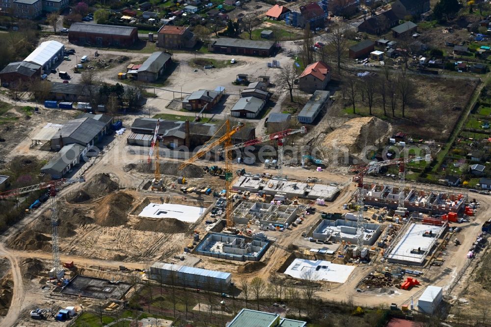 Berlin from above - Construction site to build a new multi-family residential complex Stadtgut on street Alt-Hellersdorf - Havellaender Ring in the district Hellersdorf in Berlin, Germany