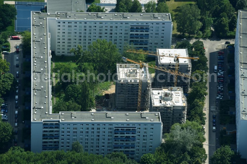 Berlin from above - Construction site to build a new multi-family residential complex townhouses Dolgenseestrasse of housing association HOWOGE in the district Lichtenberg in Berlin, Germany