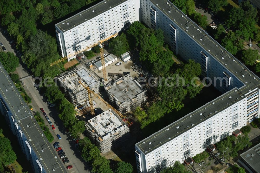 Berlin from above - Construction site to build a new multi-family residential complex townhouses Dolgenseestrasse of housing association HOWOGE in the district Lichtenberg in Berlin, Germany