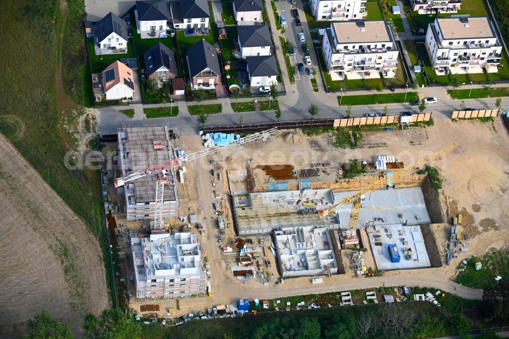 Aerial photograph Schönefeld - Construction site to build a new multi-family residential complex Stadthaeuser on Park on street Alfred-Doeblin-Allee - Grossziethener Weg in Schoenefeld in the state Brandenburg, Germany
