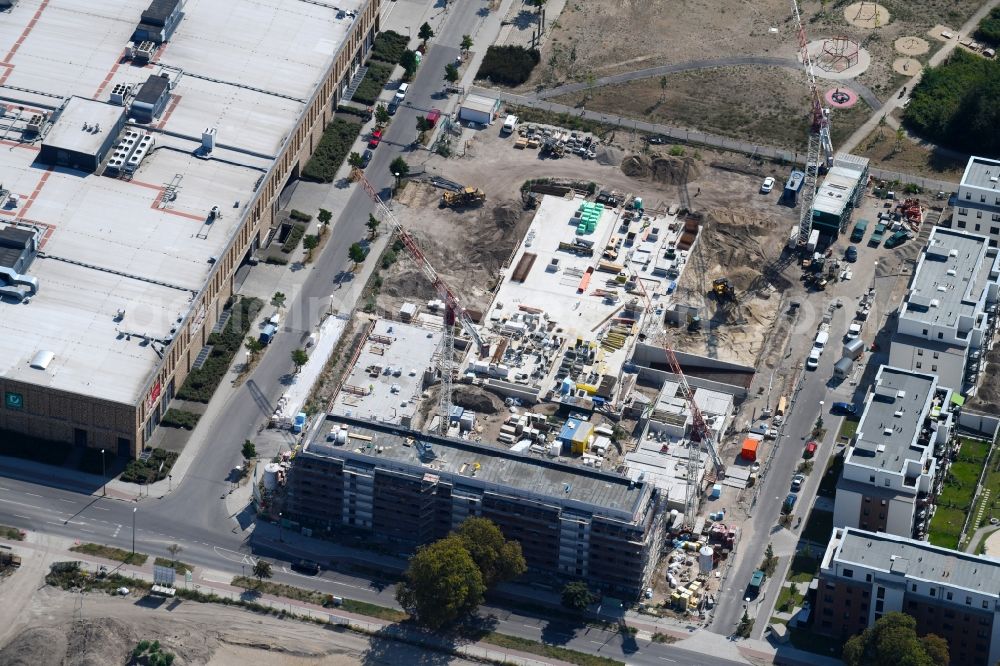 Berlin from above - Construction site to build a new multi-family residential complex of Bonava Deutschland GmbH in of Weissenhoeher Strasse destrict Biedorf in Berlin, Germany