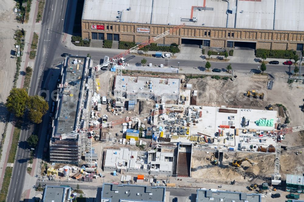 Aerial image Berlin - Construction site to build a new multi-family residential complex of Bonava Deutschland GmbH in of Weissenhoeher Strasse destrict Biedorf in Berlin, Germany