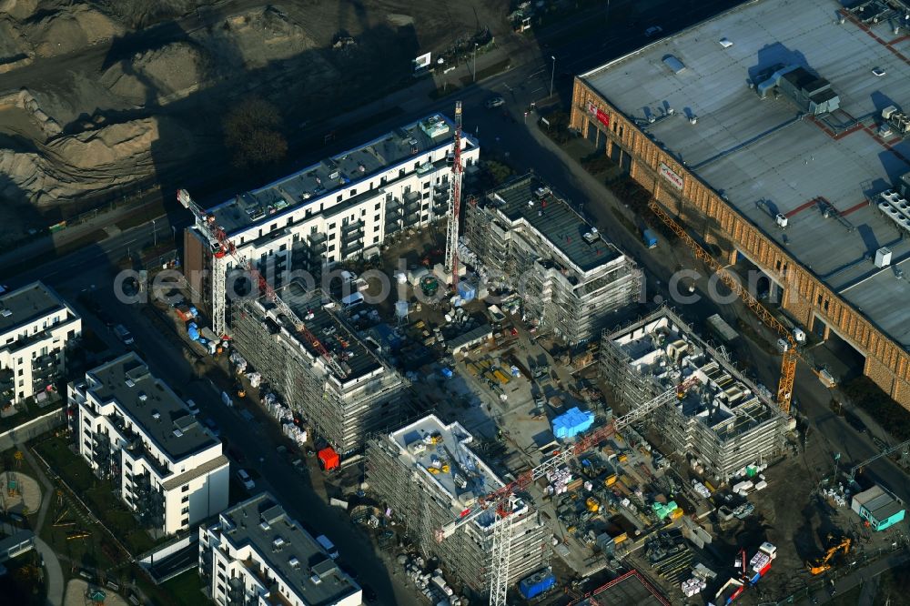 Aerial image Berlin - Construction site to build a new multi-family residential complex of Bonava Deutschland GmbH in of Weissenhoeher Strasse destrict Biedorf in Berlin, Germany