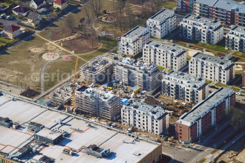 Berlin from the bird's eye view: Construction site to build a new multi-family residential complex of Bonava Deutschland GmbH in of Weissenhoeher Strasse destrict Biedorf in Berlin, Germany