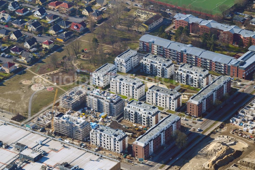 Aerial image Berlin - Construction site to build a new multi-family residential complex of Bonava Deutschland GmbH in of Weissenhoeher Strasse destrict Biedorf in Berlin, Germany