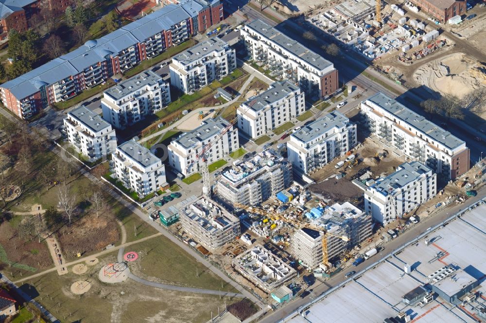 Aerial image Berlin - Construction site to build a new multi-family residential complex of Bonava Deutschland GmbH in of Weissenhoeher Strasse destrict Biedorf in Berlin, Germany