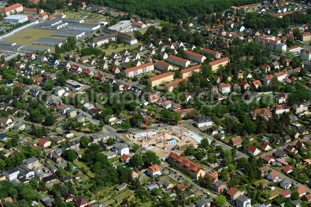 Oranienburg from the bird's eye view: Construction site to build a new multi-family residential complex Strasse of Einheit corner Waldstrasse in Oranienburg in the state Brandenburg, Germany