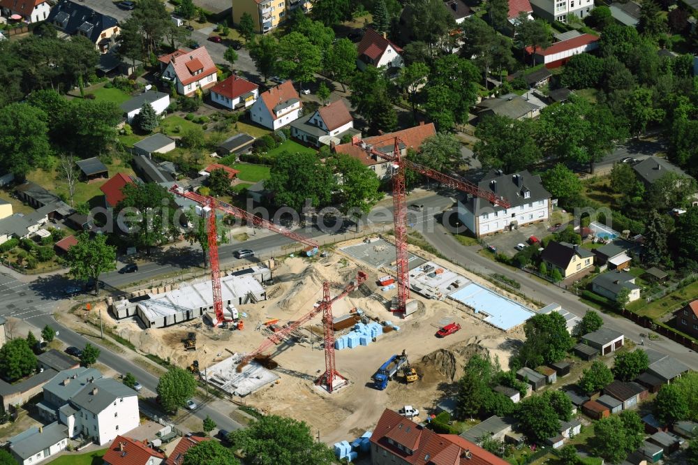 Oranienburg from above - Construction site to build a new multi-family residential complex Strasse of Einheit corner Waldstrasse in Oranienburg in the state Brandenburg, Germany