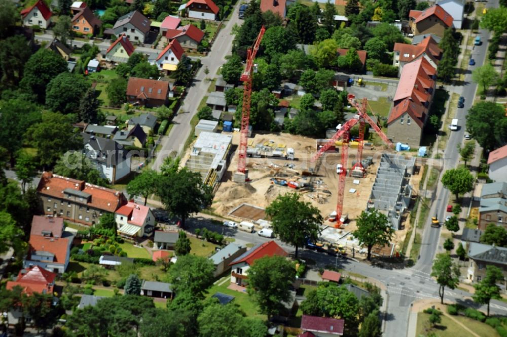 Aerial photograph Oranienburg - Construction site to build a new multi-family residential complex Strasse of Einheit corner Waldstrasse in Oranienburg in the state Brandenburg, Germany