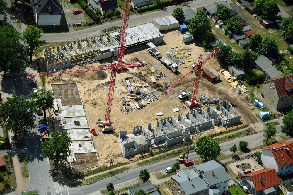 Aerial photograph Oranienburg - Construction site to build a new multi-family residential complex Strasse of Einheit corner Waldstrasse in Oranienburg in the state Brandenburg, Germany