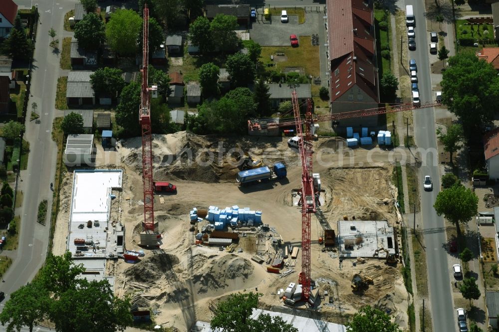 Aerial image Oranienburg - Construction site to build a new multi-family residential complex Strasse of Einheit corner Waldstrasse in Oranienburg in the state Brandenburg, Germany