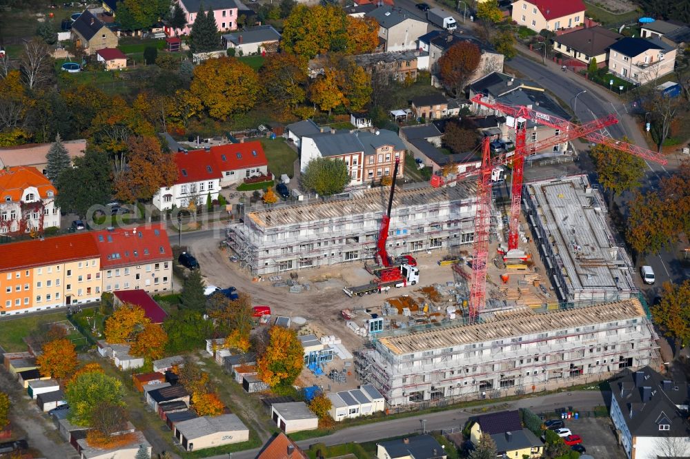 Oranienburg from the bird's eye view: Construction site to build a new multi-family residential complex Strasse of Einheit corner Waldstrasse in Oranienburg in the state Brandenburg, Germany