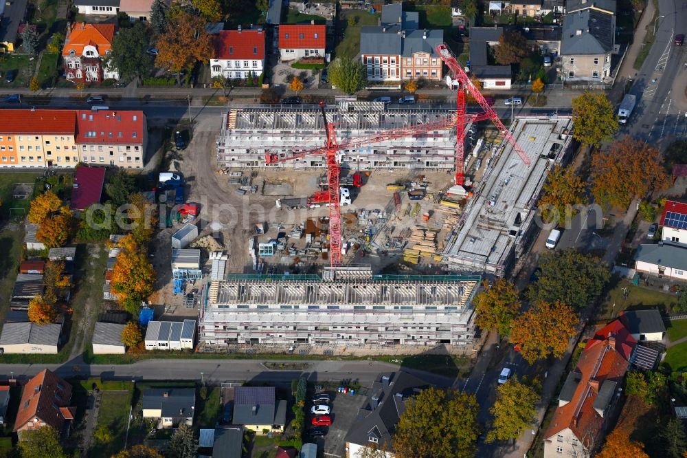 Aerial photograph Oranienburg - Construction site to build a new multi-family residential complex Strasse of Einheit corner Waldstrasse in Oranienburg in the state Brandenburg, Germany