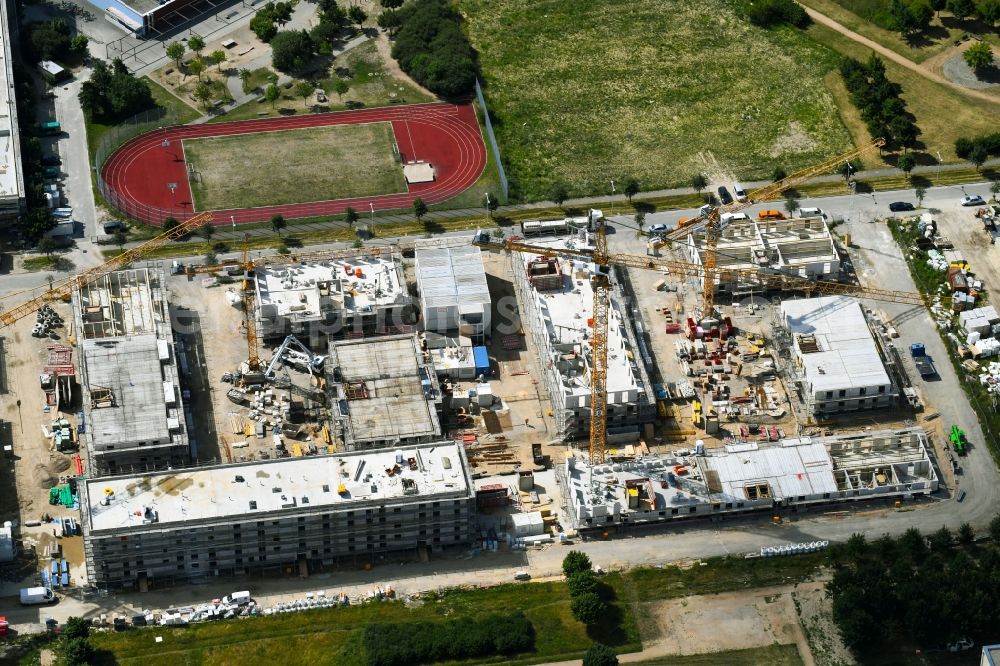 Schönefeld from above - Construction site to build a new multi-family residential complex Theodor-Fontane-Hoefe of DIE Deutsche Immobilien Entwicklungs AG on Theodor-Fontane-Allee in Schoenefeld in the state Brandenburg, Germany