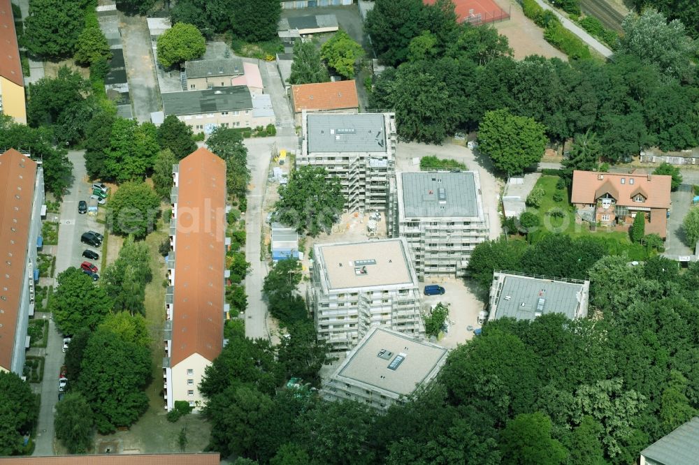 Potsdam from the bird's eye view: Construction site to build a new multi-family residential complex on Tiroler Donm in the district Potsdam Sued in Potsdam in the state Brandenburg, Germany