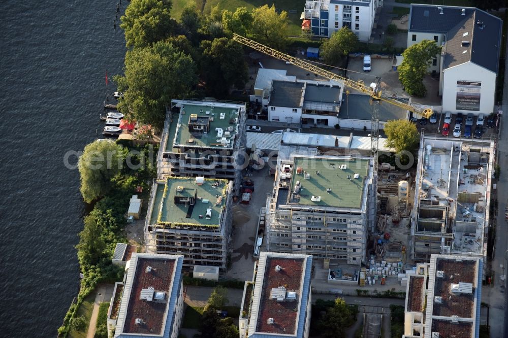 Berlin from the bird's eye view: Construction site to build a new multi-family residential complex at Koepenick Lindenstrasse in Berlin in Germany