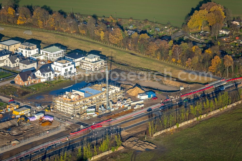 Neukirchen-Vluyn from the bird's eye view: Construction site to build a new multi-family residential complex Villa Nieofberg of GwB - Gesellschaft fuer werthaltiges Bauen mbH on Schieferstrasse in Neukirchen-Vluyn in the state North Rhine-Westphalia, Germany